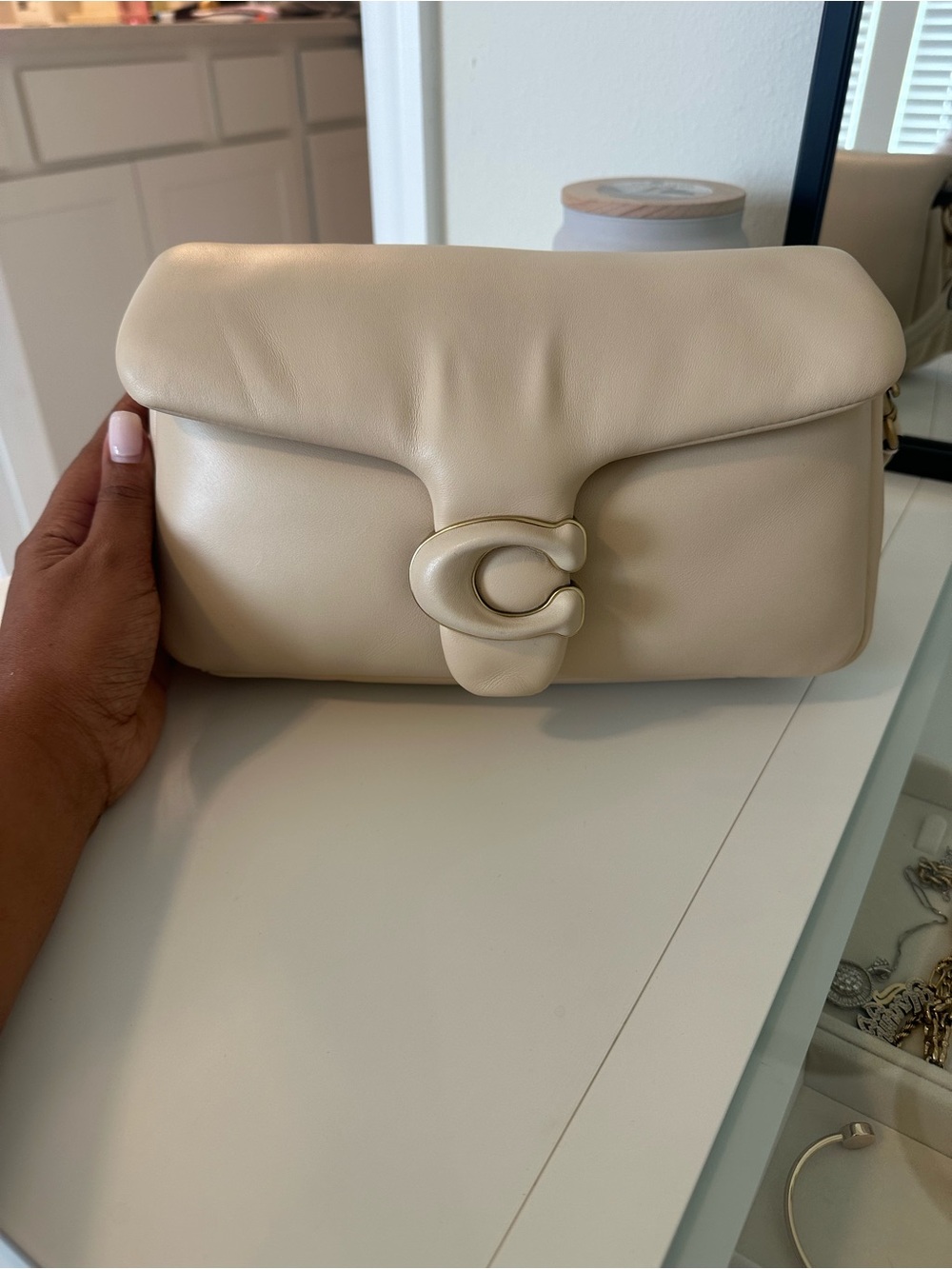Coach pillow Taby in chalk color. Used like new. Excellent condition